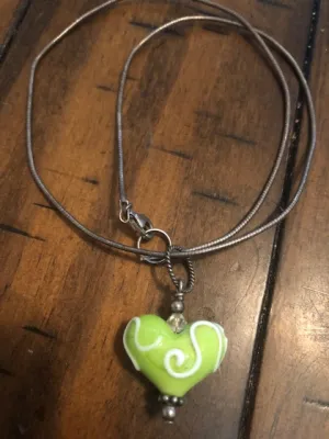 TWO THINGS EVERYONE WANTS, STERLING SILVER AND ART GLASS